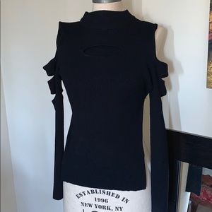 Black rubbed knit top